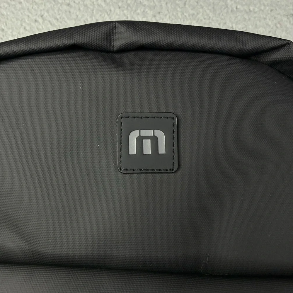 TravisMathew Backpack Black Laptop Travel Bag QISG Quanta Services Logo NWT
